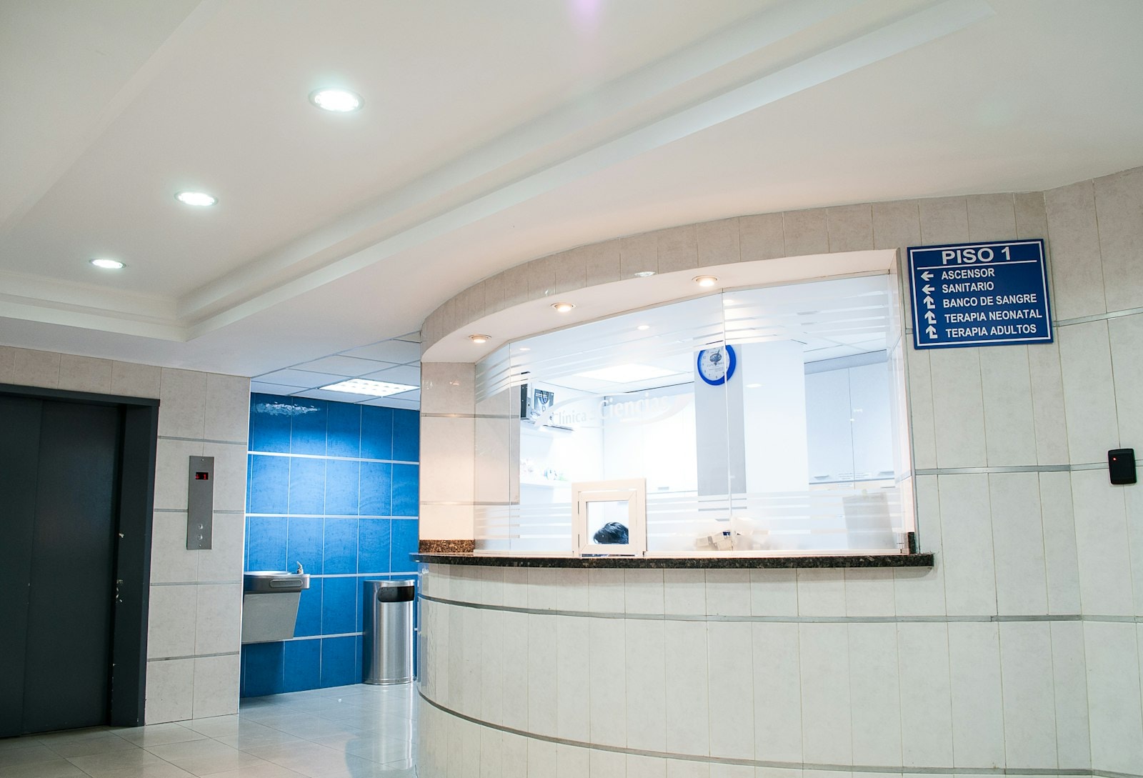 Bright modern healthcare corridor with recessed lighting