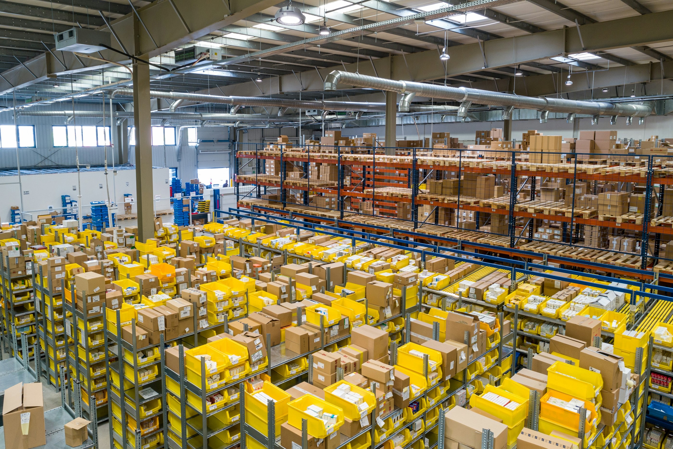 High-bay industrial logistics warehouse with LED lighting